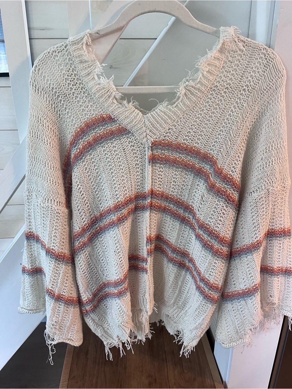 POL Cream V-Neck Fringe Sweater with Rust and Blue Stripes